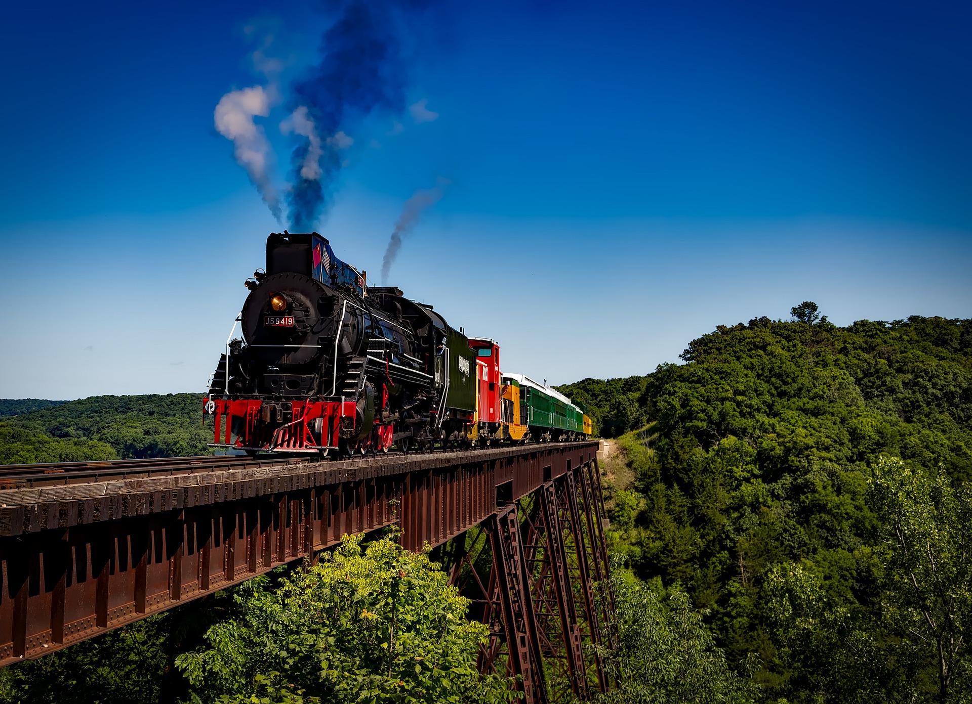 Train driving over a bridge
